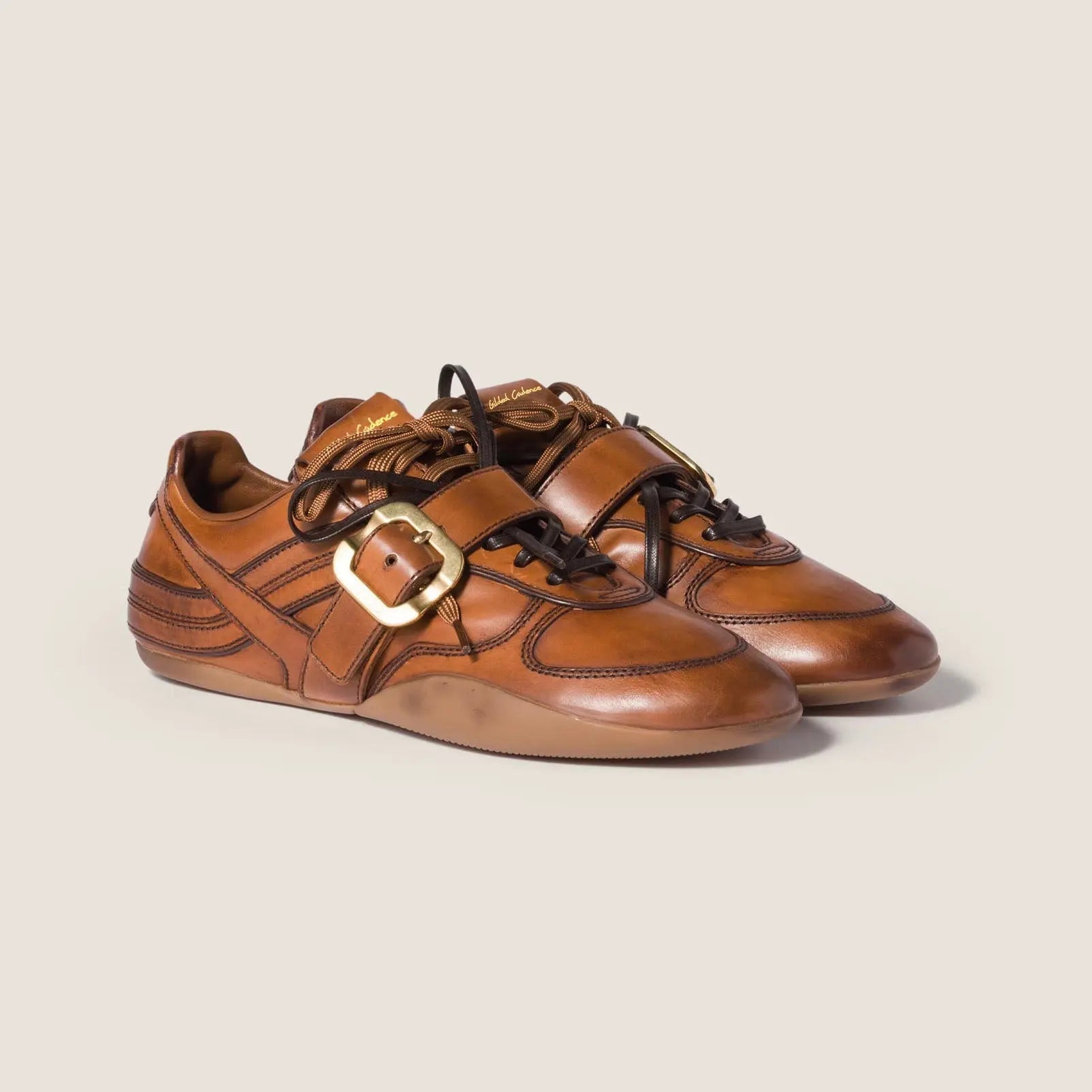 Distressed Leather Buckle Sneakers Gilded Cadence